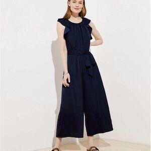 Navy blue wide legged flutter sleeve jumpsuit. LOFT
